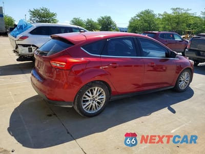 Trzecie zdjęcie samochodu z tyłu: 2017 FORD FOCUS TITANIUM VIN:1FADP3N22HL328139 - miniatura