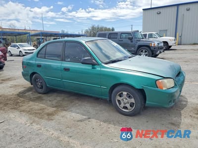 Czwarte zdjęcie samochodu z boku: 2001 HYUNDAI ACCENT GL VIN:KMHCG45C81U178604 - miniatura