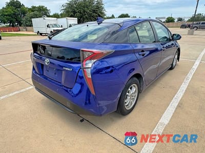 Czwarte zdjęcie samochodu z boku: 2016 TOYOTA PRIUS FOUR VIN:JTDKARFU1G3515263 - miniatura