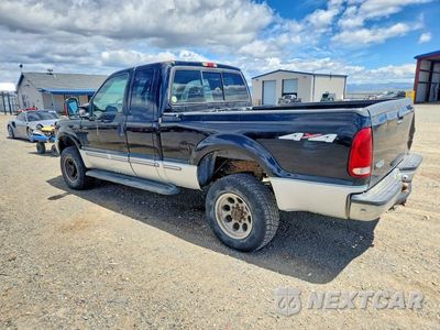 Drugie zdjęcie samochodu z przodu: 1999 FORD F250 SUPER DUTY VIN:1FTNX21S1XEA23345 - miniatura