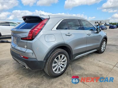 Trzecie zdjęcie samochodu z tyłu: 2023 CADILLAC XT4 PREMIUM LUXURY VIN:1GYFZCR40PF124195 - miniatura
