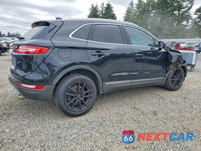 Trzecie zdjęcie samochodu z tyłu: 2017 LINCOLN MKC SELECT VIN:5LMCJ2C97HUL12832 - miniatura