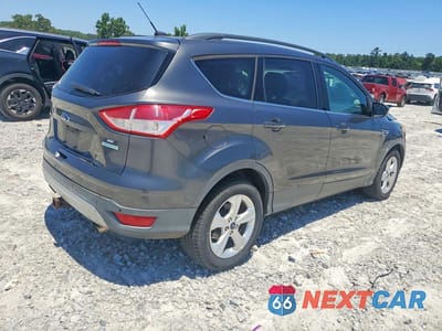 Trzecie zdjęcie samochodu z tyłu: 2015 FORD ESCAPE SE VIN:1FMCU0G96FUB10697 - miniatura
