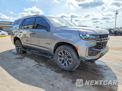 Czwarte zdjęcie samochodu z boku: 2021 CHEVROLET TAHOE K1500 Z71 VIN:1GNSKPKD8MR397638 - miniatura