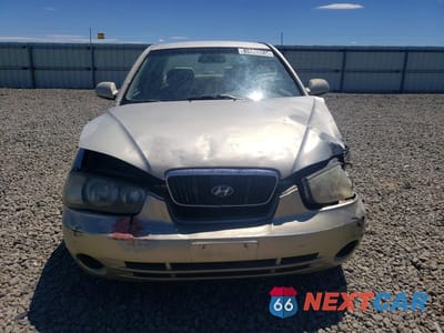 Piąte zdjęcie samochodu w środku: 2001 HYUNDAI ELANTRA GLS VIN:KMHDN45D81U091224 - miniatura