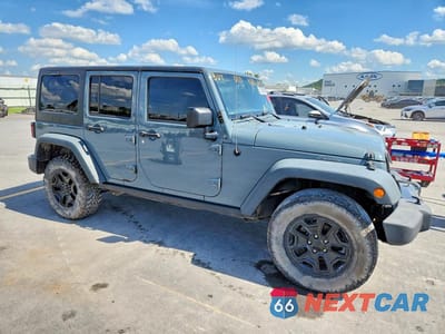 Czwarte zdjęcie samochodu z boku: 2014 JEEP WRANGLER UNLIMITED SPORT VIN:1C4BJWDGXEL255616 - miniatura