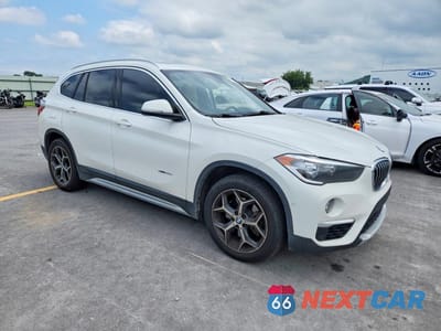 Czwarte zdjęcie samochodu z boku: 2018 BMW X1 SDRIVE28I VIN:WBXHT3C33J5K21133 - miniatura