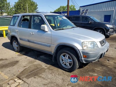 Czwarte zdjęcie samochodu z boku: 1999 HONDA CR-V EX VIN:JHLRD1865XC048857 - miniatura