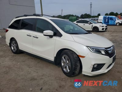 Czwarte zdjęcie samochodu z boku: 2018 HONDA ODYSSEY EXL VIN:5FNRL6H76JB003328 - miniatura