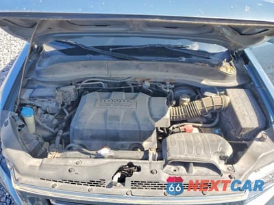 Zdjęcie 11 z 12 samochodu: 2006 HONDA RIDGELINE RTS VIN:2HJYK16496H520744 - miniatura