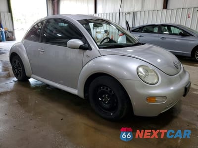 Czwarte zdjęcie samochodu z boku: 2001 VOLKSWAGEN NEW BEETLE GL VIN:3VWBS21C71M416470 - miniatura