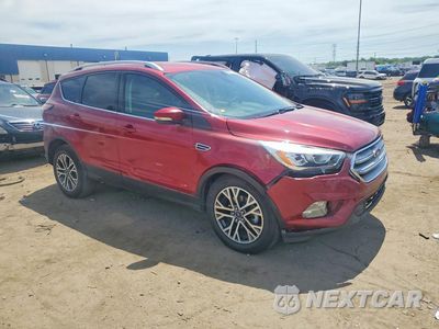 Czwarte zdjęcie samochodu z boku: 2017 FORD ESCAPE TITANIUM VIN:1FMCU0JD7HUC62097 - miniatura