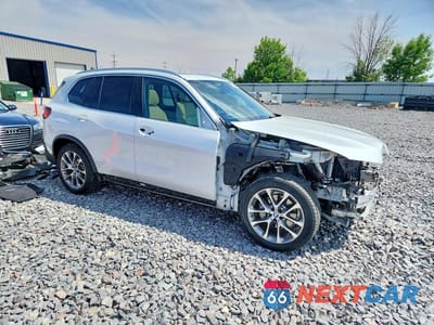 Czwarte zdjęcie samochodu z boku: 2021 BMW X5 XDRIVE40I VIN:5UXCR6C02M9F19328 - miniatura