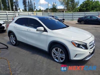 Czwarte zdjęcie samochodu z boku: 2015 MERCEDES-BENZ GLA 250 4MATIC VIN:WDCTG4GB2FJ148140 - miniatura