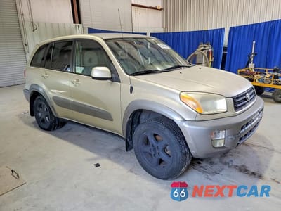 Czwarte zdjęcie samochodu z boku: 2001 TOYOTA RAV4 BASE VIN:JTEHH20V110022881 - miniatura