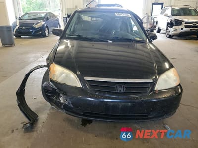 Piąte zdjęcie samochodu w środku: 2001 HONDA CIVIC LX VIN:1HGES16571L013502 - miniatura