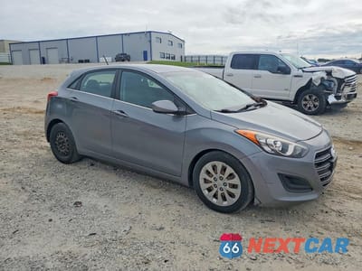 Czwarte zdjęcie samochodu z boku: 2017 HYUNDAI ELANTRA GT BASE VIN:KMHD35LH5HU347458 - miniatura