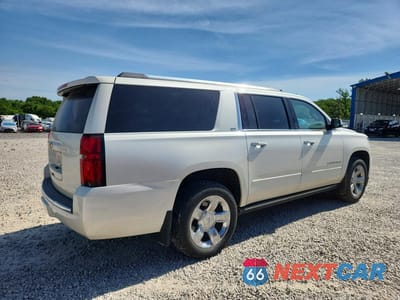 Trzecie zdjęcie samochodu z tyłu: 2015 CHEVROLET SUBURBAN K1500 LTZ VIN:1GNSKKKCXFR621005 - miniatura
