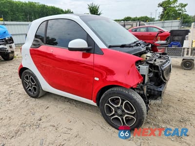 Czwarte zdjęcie samochodu z boku: 2017 SMART FORTWO VIN:WMEFJ5DA2HK205604 - miniatura
