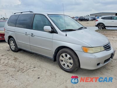 Czwarte zdjęcie samochodu z boku: 2002 HONDA ODYSSEY EXL VIN:2HKRL18032H514861 - miniatura