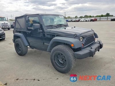 Czwarte zdjęcie samochodu z boku: 2013 JEEP WRANGLER SPORT VIN:1C4AJWAG7DL657933 - miniatura