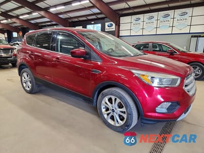 Czwarte zdjęcie samochodu z boku: 2017 FORD ESCAPE SE VIN:1FMCU9GDXHUA74301 - miniatura
