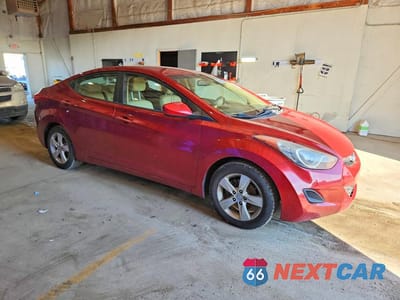 Czwarte zdjęcie samochodu z boku: 2011 HYUNDAI ELANTRA GLS VIN:KMHDH4AE6BU107573 - miniatura