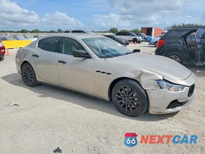 Czwarte zdjęcie samochodu z boku: 2014 MASERATI GHIBLI S VIN:ZAM57RTAXE1088756 - miniatura