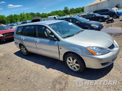 Czwarte zdjęcie samochodu z boku: 2004 MITSUBISHI LANCER LS VIN:JA3AD29F84U044126 - miniatura