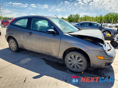 Czwarte zdjęcie samochodu z boku: 2006 FORD FOCUS ZX3 VIN:1FAHP31N46W185093 - miniatura