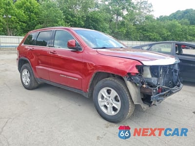 Czwarte zdjęcie samochodu z boku: 2014 JEEP GRAND CHEROKEE LAREDO VIN:1C4RJFAG9EC224991 - miniatura