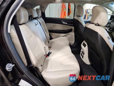 Zdjęcie 11 z 13 samochodu: 2019 FORD EDGE TITANIUM VIN:2FMPK4K95KBB57354 - miniatura