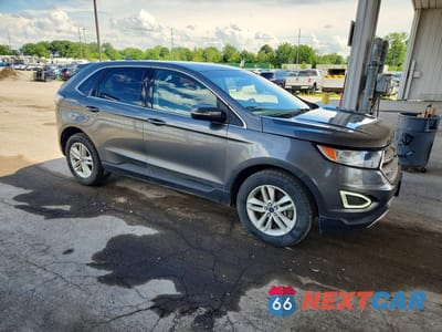 Czwarte zdjęcie samochodu z boku: 2017 FORD EDGE SEL VIN:2FMPK4J91HBC37339 - miniatura