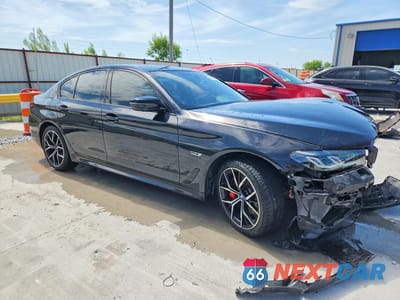 Czwarte zdjęcie samochodu z boku: 2022 BMW 530XE VIN:WBA33AG08NCK77093 - miniatura