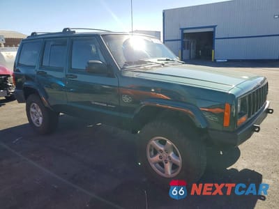 Czwarte zdjęcie samochodu z boku: 2000 JEEP CHEROKEE SPORT VIN:1J4FF48S9YL268300 - miniatura