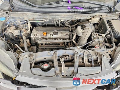 Zdjęcie 12 z 14 samochodu: 2012 HONDA CR-V EXL VIN:2HKRM4H73CH104008 - miniatura
