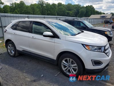 Czwarte zdjęcie samochodu z boku: 2016 FORD EDGE SEL VIN:2FMPK4J97GBB09282 - miniatura