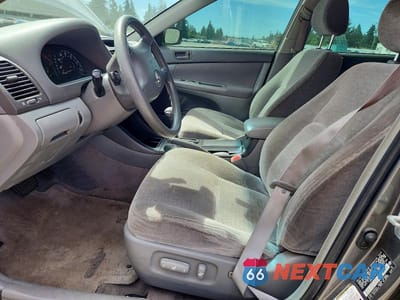 Zdjęcie 7 z 12 samochodu: 2004 TOYOTA CAMRY LE VIN:JTDBE32K340297653 - miniatura