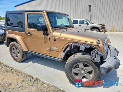 Czwarte zdjęcie samochodu z boku: 2015 JEEP WRANGLER SPORT VIN:1C4AJWAG1FL607130 - miniatura