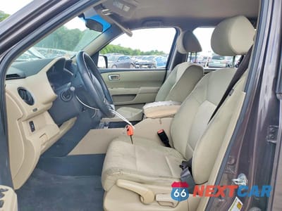 Zdjęcie 7 z 13 samochodu: 2012 HONDA PILOT VIN:5FNYF3H22CB008115 - miniatura
