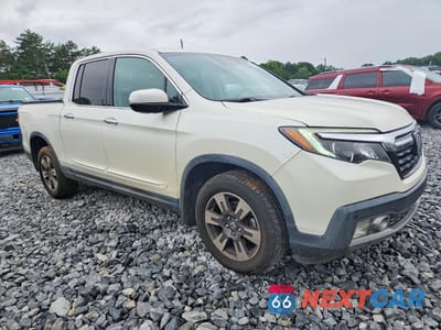 Czwarte zdjęcie samochodu z boku: 2017 HONDA RIDGELINE RTL VIN:5FPYK3F70HB028517 - miniatura