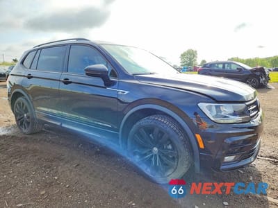 Czwarte zdjęcie samochodu z boku: 2021 VOLKSWAGEN TIGUAN SE VIN:3VV2B7AX1MM066195 - miniatura