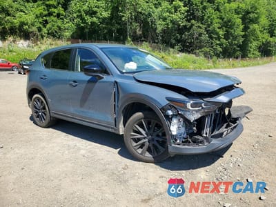 Czwarte zdjęcie samochodu z boku: 2023 MAZDA CX-5 PREFERRED VIN:JM3KFBCM0P0111201 - miniatura