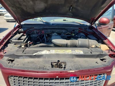 Zdjęcie 12 z 13 samochodu: 2000 FORD EXPEDITION EDDIE BAUER VIN:1FMRU17L3YLB58615 - miniatura