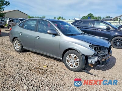 Czwarte zdjęcie samochodu z boku: 2010 HYUNDAI ELANTRA GLS VIN:KMHDU4AD6AU064709 - miniatura