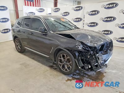 Czwarte zdjęcie samochodu z boku: 2022 BMW X3 SDRIVE30I VIN:5UX43DP04N9N34528 - miniatura