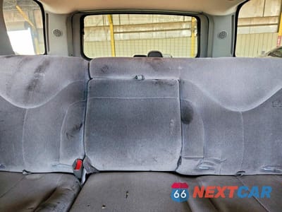 Zdjęcie 10 z 13 samochodu: 2002 GMC YUKON VIN:1GKEC13T22R132849 - miniatura