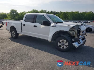 Czwarte zdjęcie samochodu z boku: 2015 FORD F150 SUPERCREW VIN:1FTFW1EF5FFB50140 - miniatura