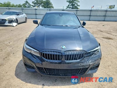 Piąte zdjęcie samochodu w środku: 2021 BMW 330I VIN:3MW5R1J02M8B86360 - miniatura