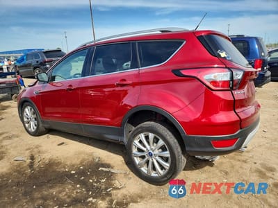 Drugie zdjęcie samochodu z przodu: 2018 FORD ESCAPE TITANIUM VIN:1FMCU0J90JUD03378 - miniatura